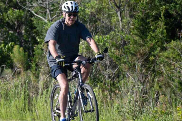 Joe Biden falls off his bike, but gets up quickly