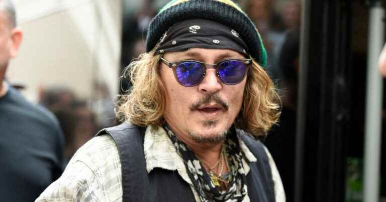 Johnny Depp soon to be a dad?  Why this photo of the actor ignited the web after the trial…