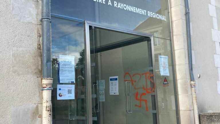 The inscription “nazis” and a swastika tagged on the facade of the conservatory of Poitiers