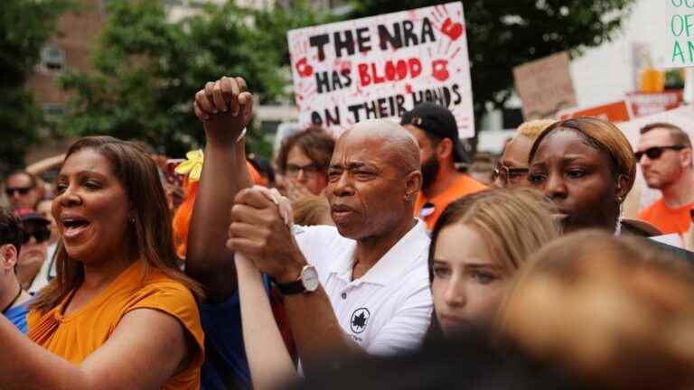 thousands of demonstrators call for better firearms regulations