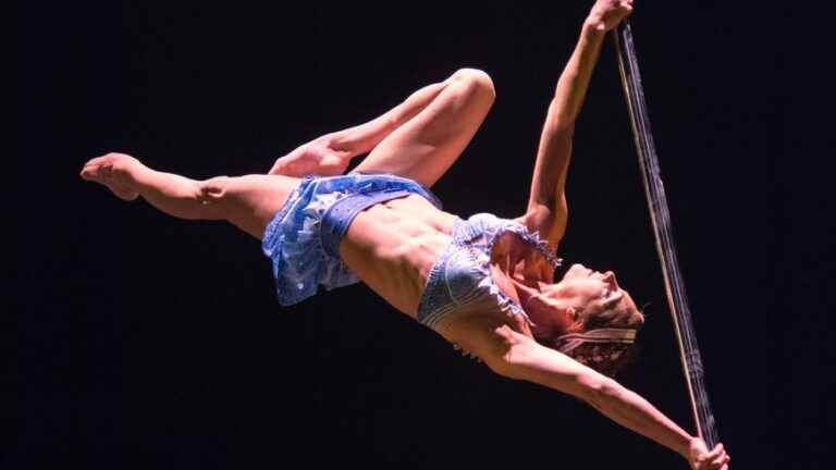 An acrobat from the region in the Corteo show by Cirque du Soleil in Nice in July