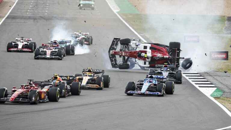 Guanyu Zhou evacuated by ambulance but conscious after serious crash at start of British Grand Prix