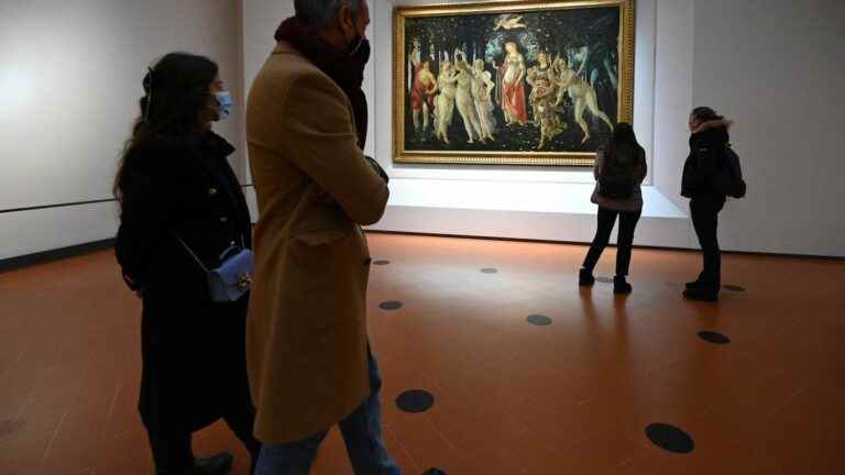 In Italy, environmental activists stick their hands to the glass of a painting by Botticelli