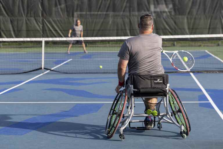 Inclusive Tennis League |  One in a wheelchair, the other standing