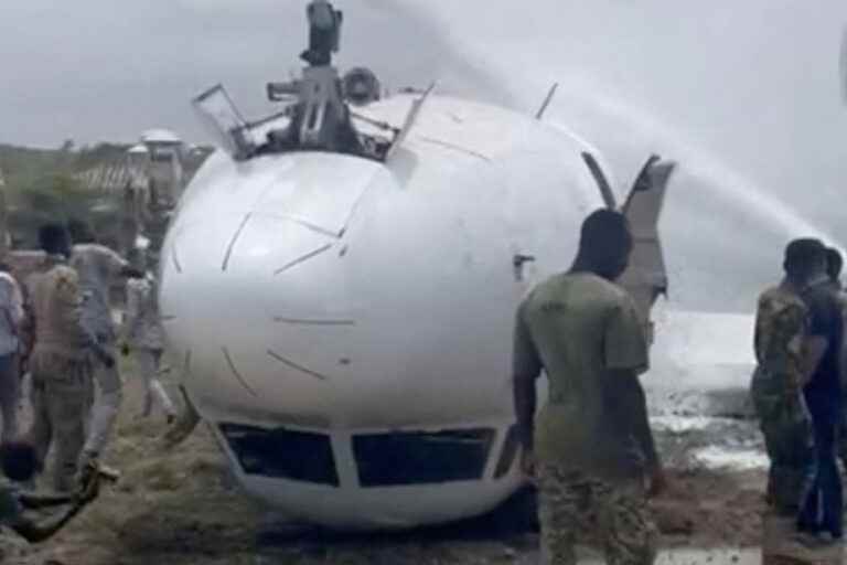 Plane flips over on landing in Somalia