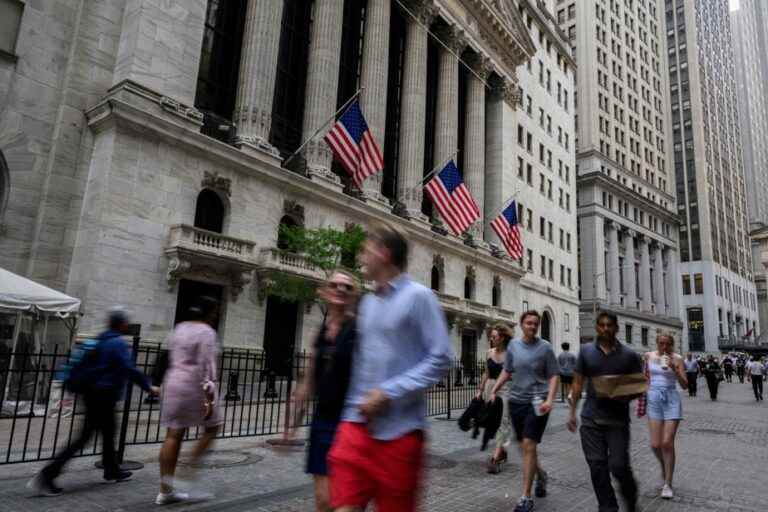 Wall Street ends higher, encouraged by corporate results