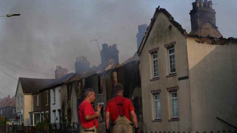 a spectacular fire ravages a village in east London