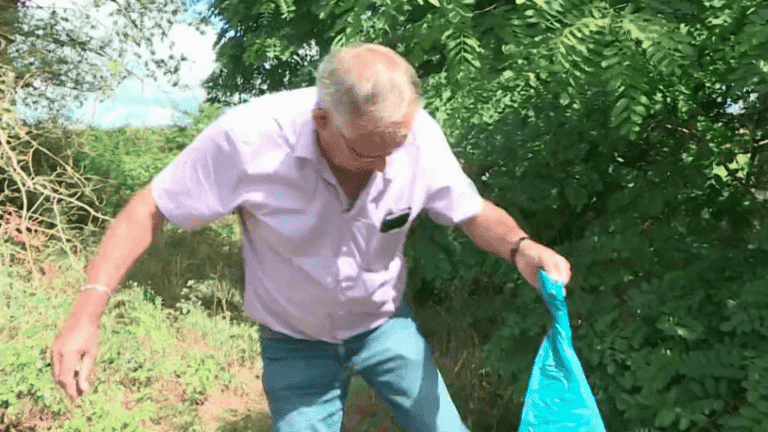 an angry mayor returns the trash bags to his owner