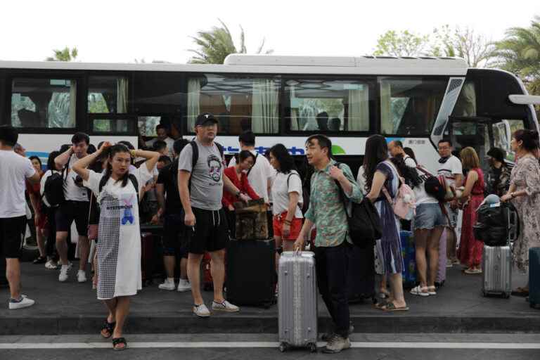 COVID-19 in China |  80,000 tourists stranded on island after case detected