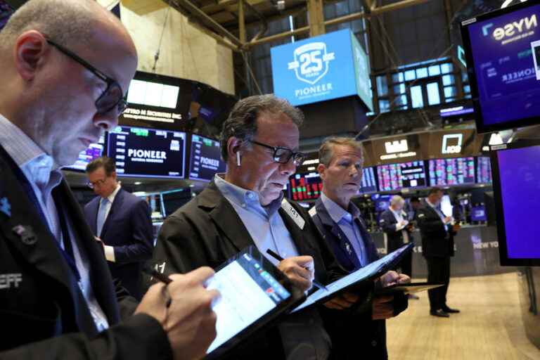 Wall Street opens slightly lower