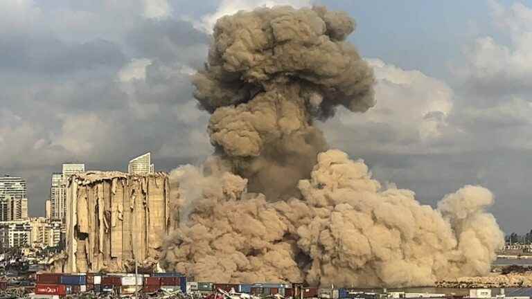 a new part of the grain silos in the port of Beirut collapses