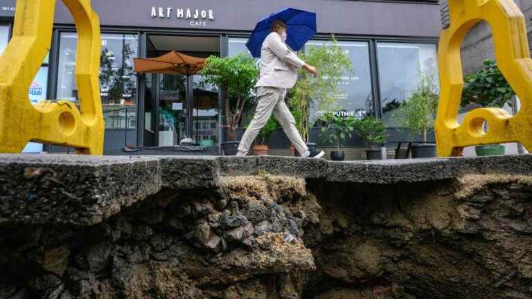 flood toll rises to nine dead and seven missing