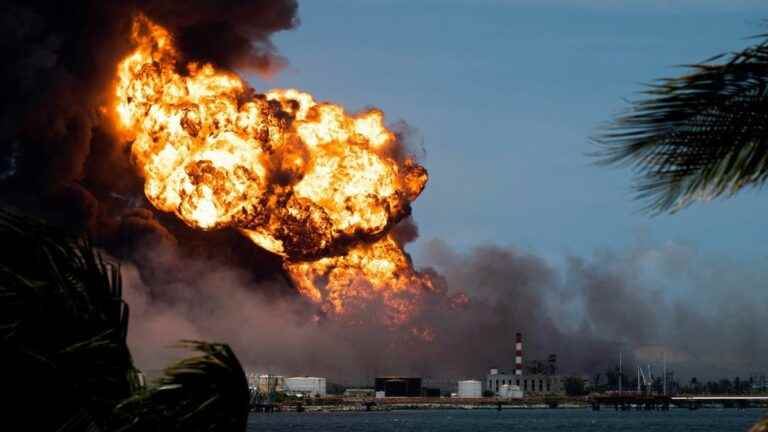 the fire of an oil depot still out of control