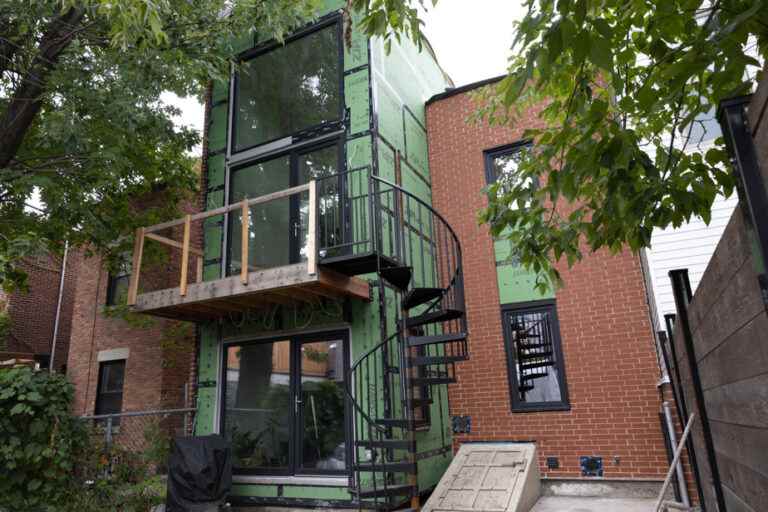 A century-old duplex transformed into a model of energy efficiency