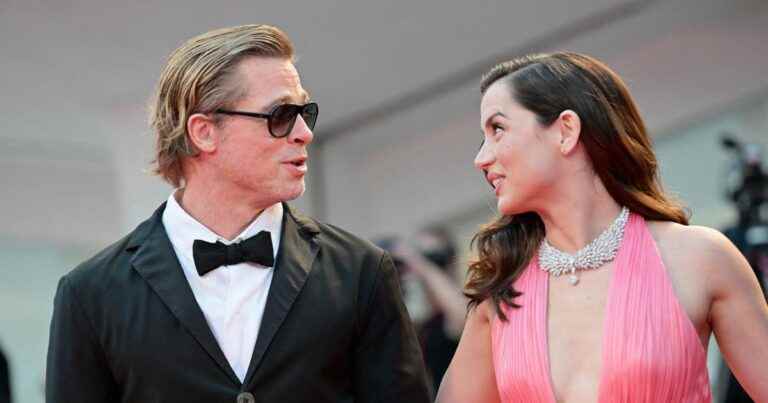 Brad Pitt in a bow tie and sneakers on the arm of Ana de Armas, divine Marilyn in pink at the Venice Film Festival