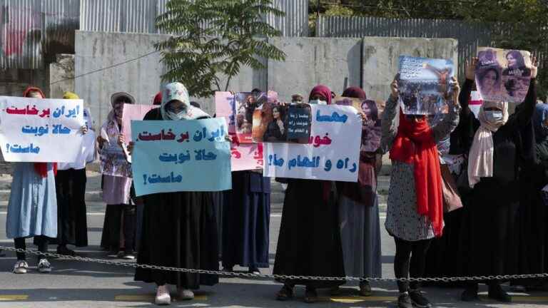 Taliban fire in the air to disperse a demonstration in support of Iranian women