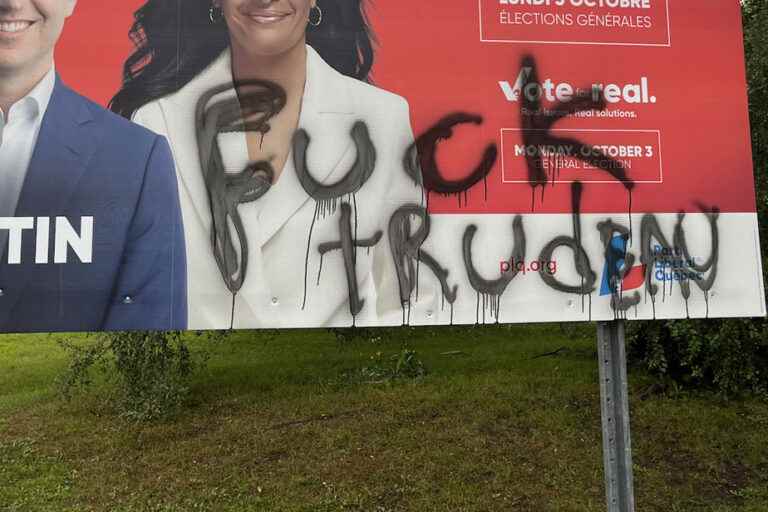 The office and signs of Liberal candidate André Fortin vandalized