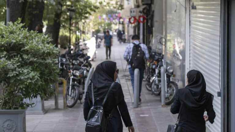 a demonstration dispersed with tear gas after the death of a young woman arrested for her dress