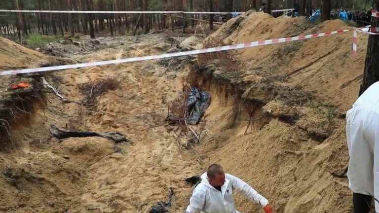 in Izioum, investigators begin to exhume the bodies of the more than 400 graves discovered