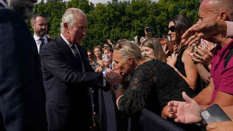 in the streets of London, the British divided on their new king