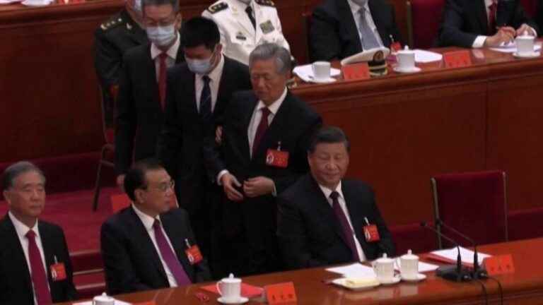 ex-president Hu Jintao escorted out