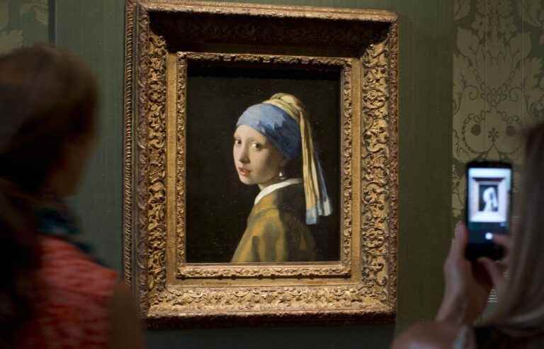 Environmental activists attack Johannes Vermeer’s ‘Girl with a Pearl Earring’ painting at the Mauritshuis museum in The Hague