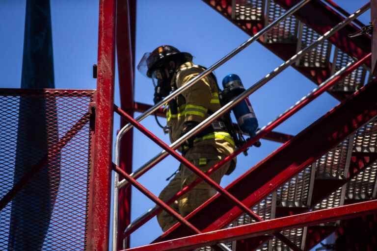 Fire Safety |  A ceremony honors 27 firefighters and a citizen for their dedication