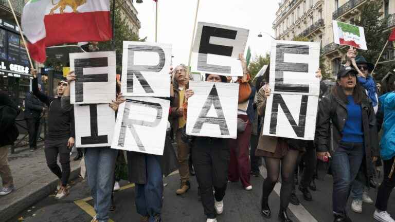 Thousands of demonstrators take to the streets in Paris to support the Iranian people