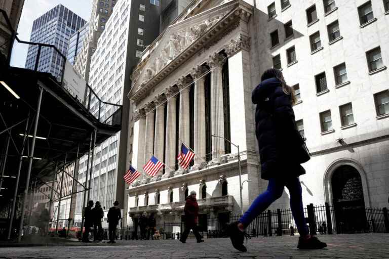 Wall Street ends lower awaiting inflation data