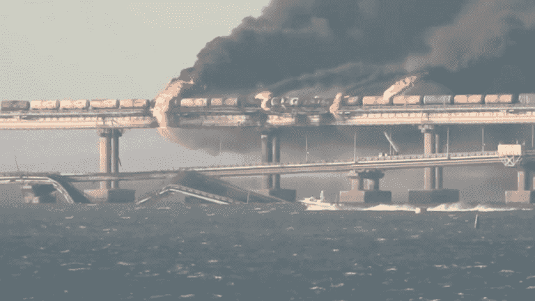 a strategic bridge partly destroyed by an explosion