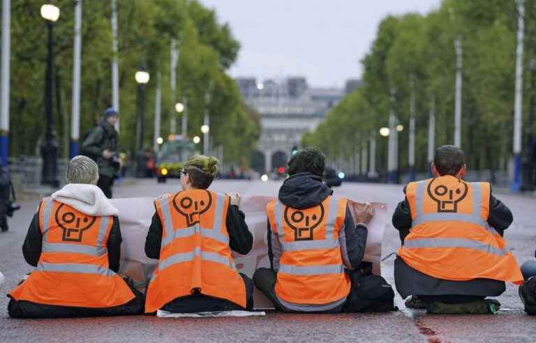 Activists from environmental group Just Stop Oil lead an action outside Downing Street