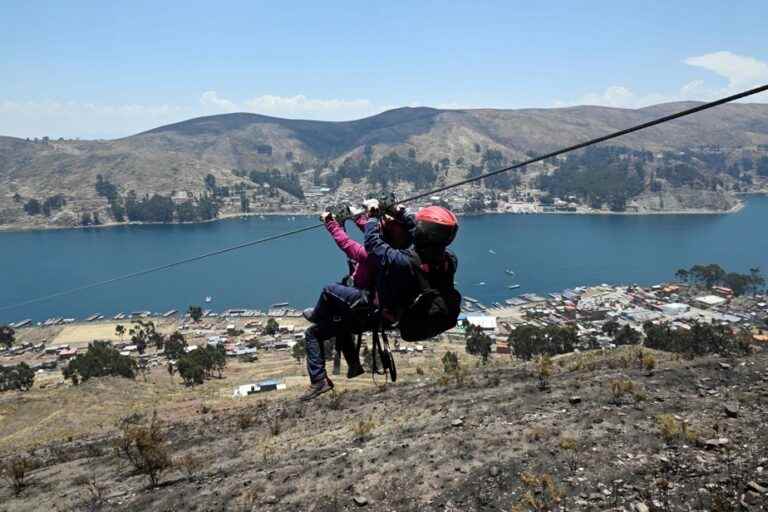 Bolivia |  Adrenaline seekers cross Lake Titicaca on a zipline