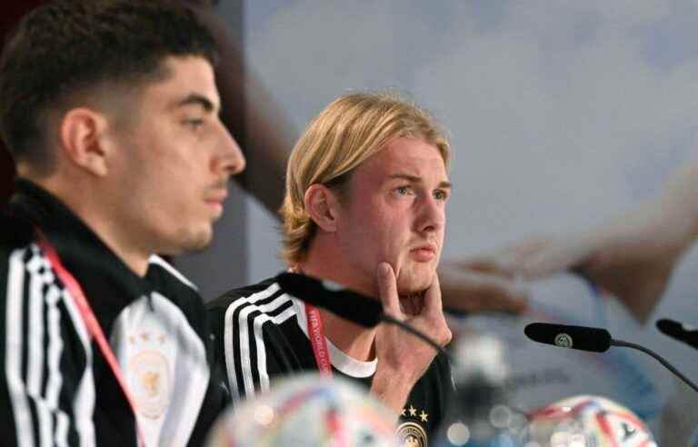 The ‘One Love’ logo behind Germany’s players at the World Cup