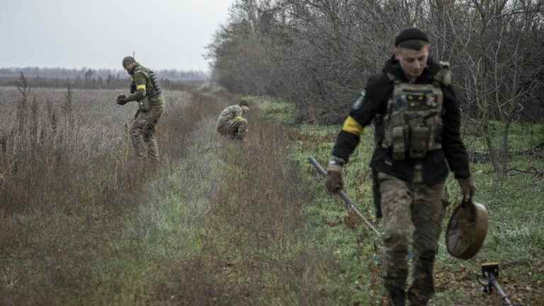 in Ukraine, painstaking work to neutralize the explosives that litter the liberated territories