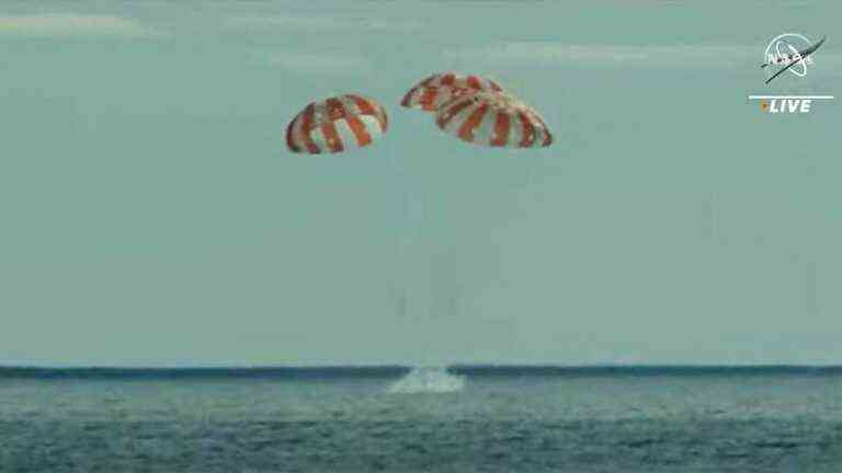 the Orion spacecraft successfully lands after a crucial mission around the Moon