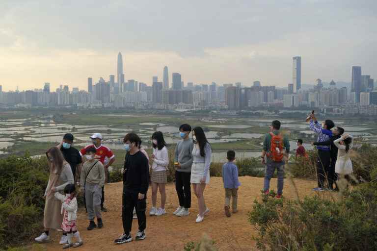 Border between Hong Kong and mainland China reopens to travelers on Sunday