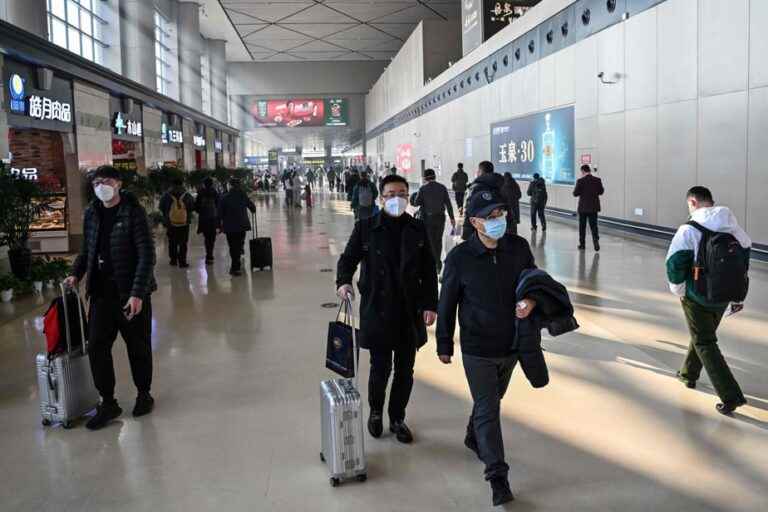 China lifts mandatory quarantine for international travelers