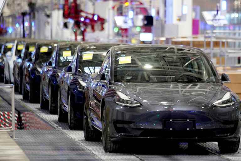 Tesla lowers car prices, stock falls on Wall Street