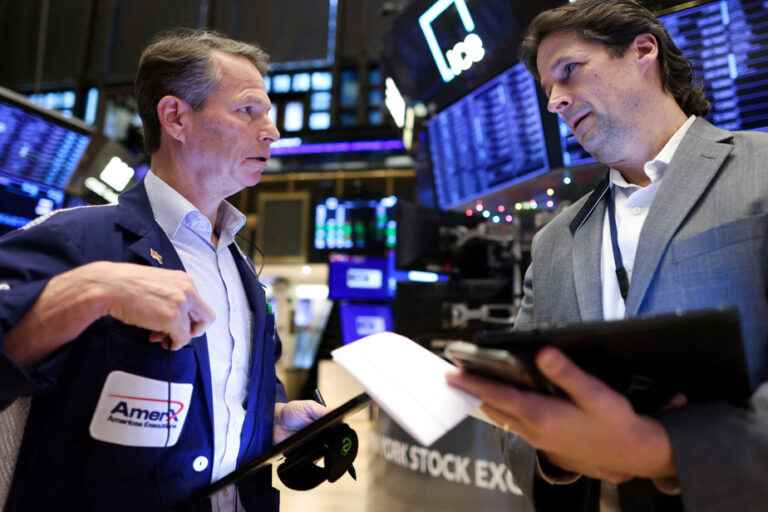 Wall Street ends higher, highest in a month