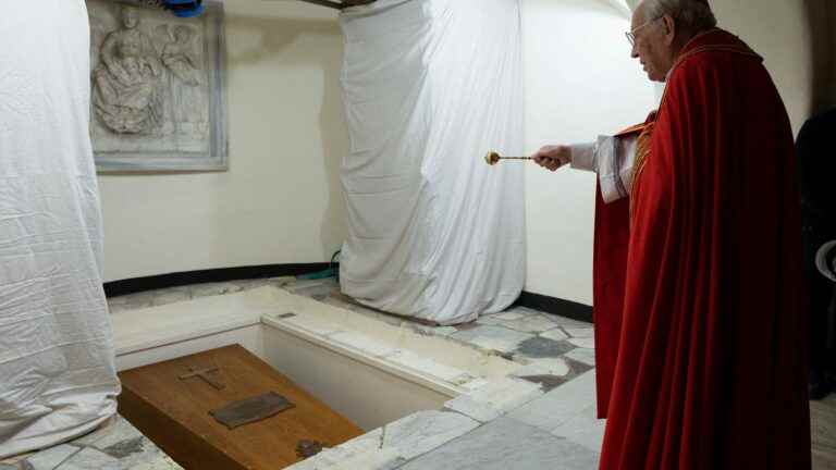 the former pope buried in the Vatican after a final tribute from Francis