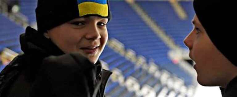 Big smiles for the little Ukrainian hockey players at the sight of the rink