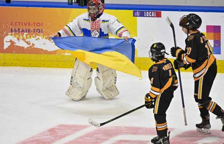 The Canadian receives the Ukrainian pee-wee team