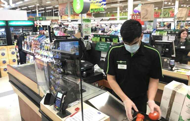 The plexiglass installed during the COVID-19 pandemic is starting to disappear at checkouts