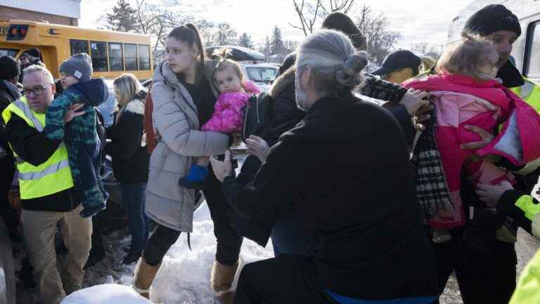 a bus hits a daycare center near Montreal, killing two children and injuring several