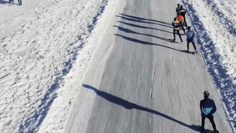 a giant ice skate race on a frozen lake