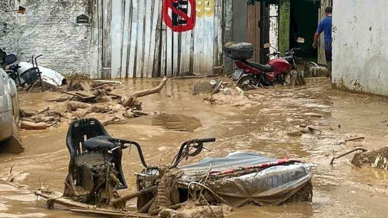 a storm kills at least 36 in the south-east of the country