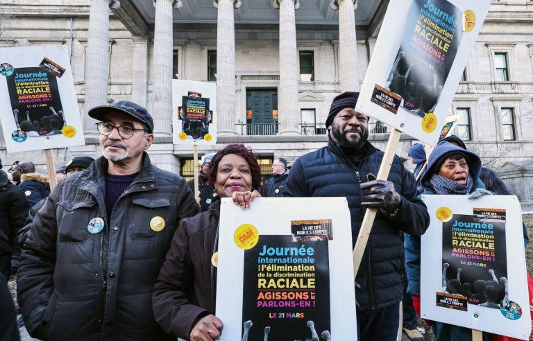 Blue collar workers demonstrate against racism