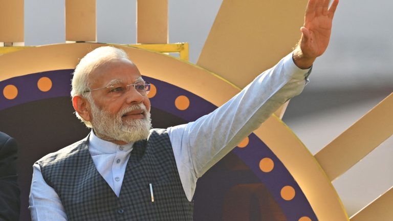 In India, Narendra Modi feeds the cult of his personality by parading on a float in a cricket stadium