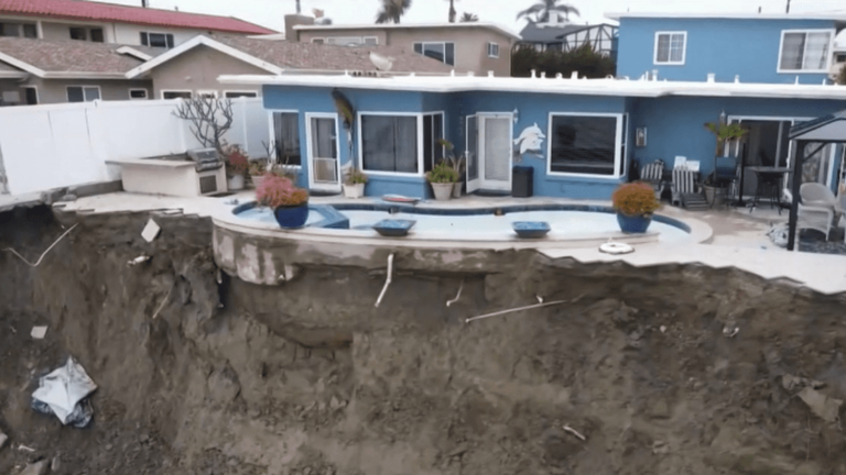 a landslide threatens many homes