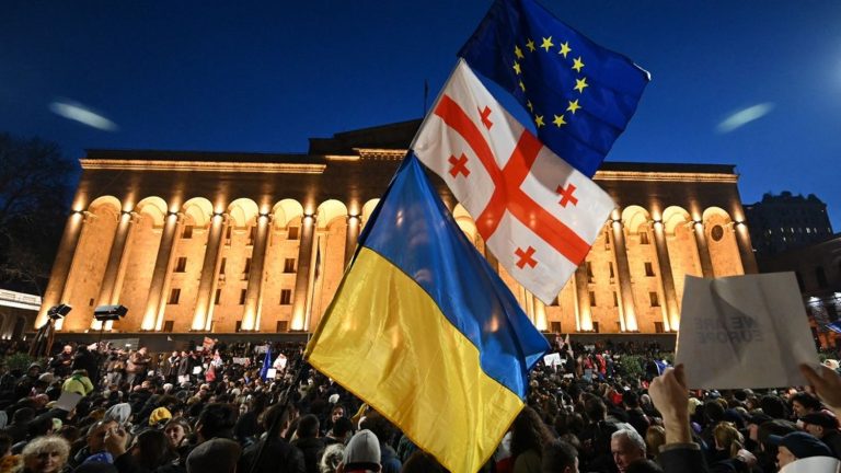 police use tear gas to disperse thousands of protesters gathered in Tbilisi against controversial law